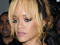 Rihanna takes a swipe at fan with microphone