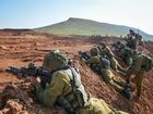 Israel warns Hezbollah over convoy attack