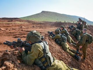 Israel warns Hezbollah over convoy attack