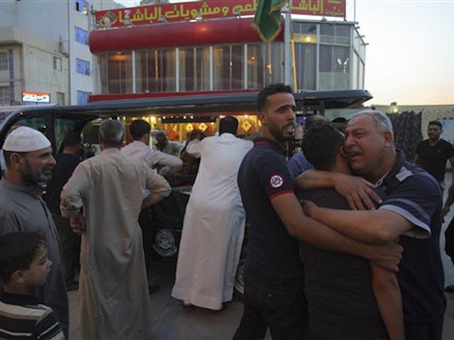 Twin suicide attack hits Baghdad police station